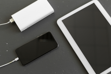 Smartphone charging with power bankの写真素材