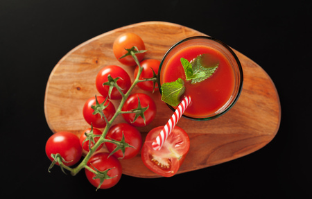 Tomato juice with tomatoesの写真素材