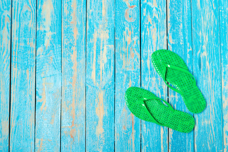 flip-flops on color wooden backgroundの写真素材