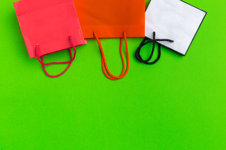 paper shopping bag on colorful backgroundの写真素材