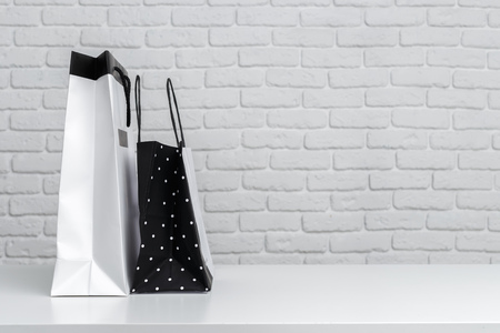 Shopping bags on tableの写真素材