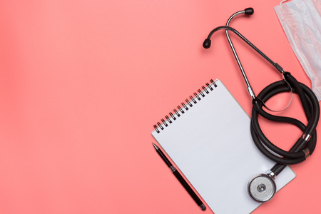 Medical equipment on a pink pastel background.の写真素材