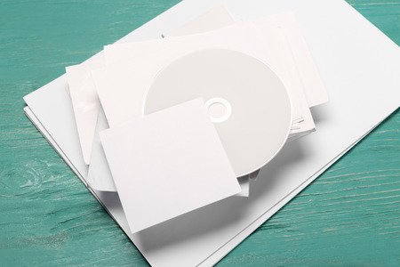 CD disk on wooden tableの写真素材