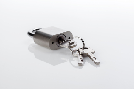 silver padlock isolated on the white backgroundの写真素材