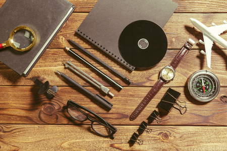 wooden desk with office toolsの写真素材