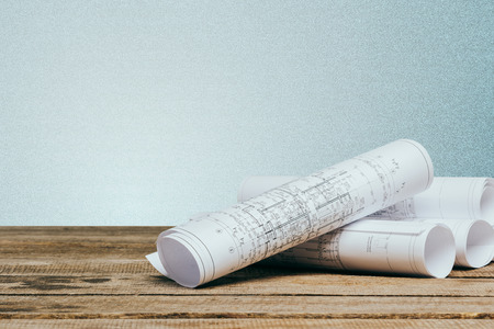 Architectural blueprints on a table close upの写真素材