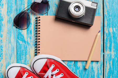 Vintage camera and gumshoesの写真素材