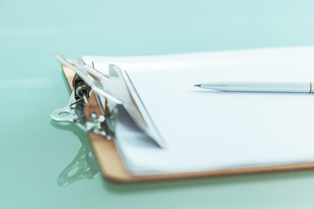 Office clipboard on the table close upの写真素材