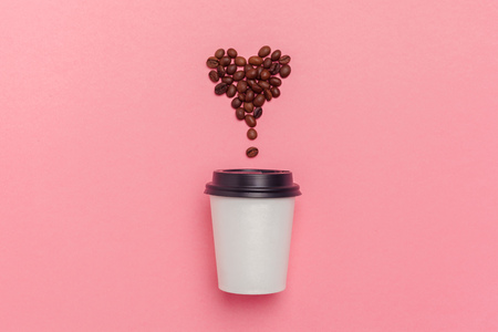 take away coffee cup on colorful paper backgroundの写真素材