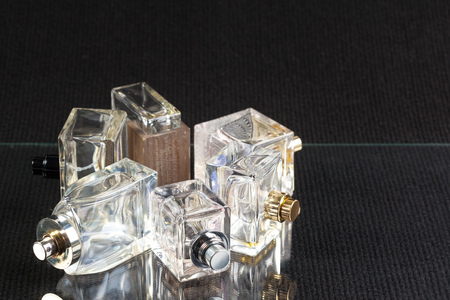 perfume bottle on a dark background