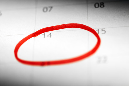 Closeup of dates on calendar pageの写真素材