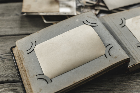 retro some old photos on wooden tableの写真素材