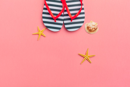 Female flip flops on a colorful vibrant backgroundの写真素材