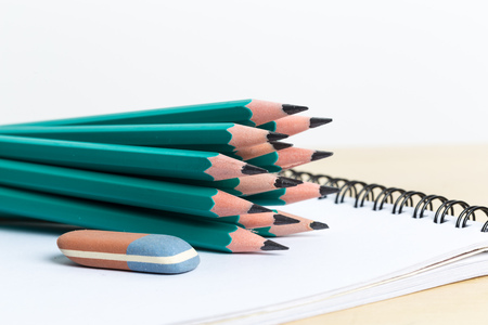 notebooks and pencil