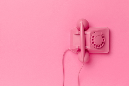 vintage phone on color backgroundの写真素材