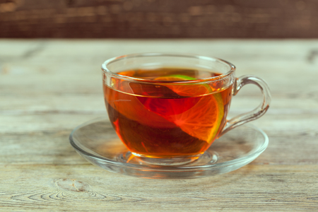 Cup of tea on wooden tableの写真素材