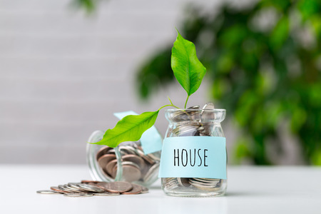 money saving in the glass bottle for money conceptの写真素材