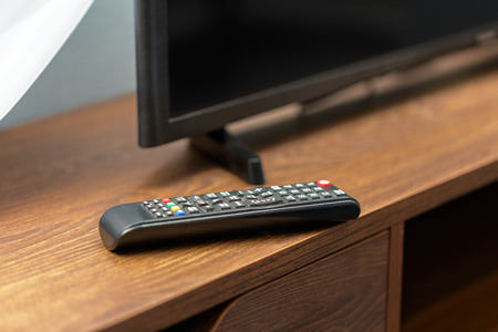 Watching TV and using remote controller