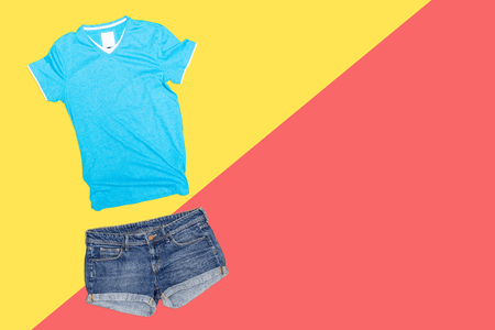 Collage of female clothes on bright colored backgroundの写真素材