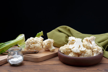 Organic cauliflower on wooden backgroundの写真素材