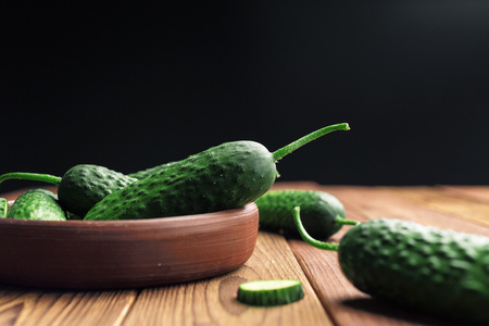 Cucumber on wooden backgroundの写真素材