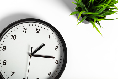 Simple classic black and white round wall clockの写真素材