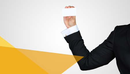 Unrecognizable businessman holding blank piece of paper with copy spaceの写真素材