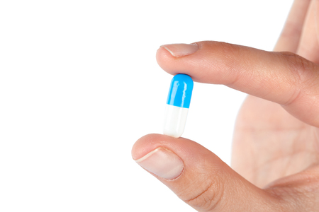 pills in woman handの写真素材