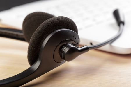 headset on keyboard computer laptopの写真素材