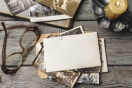 retro some old photos on wooden tableの写真素材