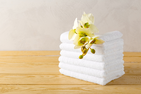 towels roll with flowerの写真素材