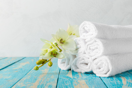 towels with orchid flowerの写真素材