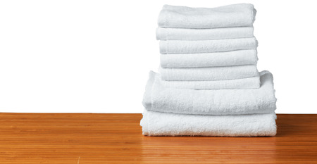 white spa towels on the tableの写真素材