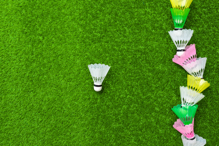 badminton shuttlecock on green background concept photoの写真素材