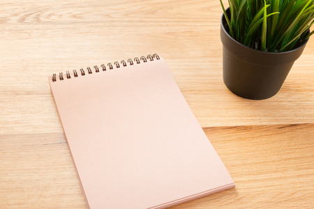 spiral notebook on wooden tableの写真素材