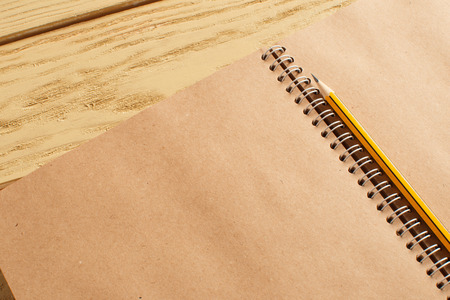 open notepad on wooden backgroundの写真素材