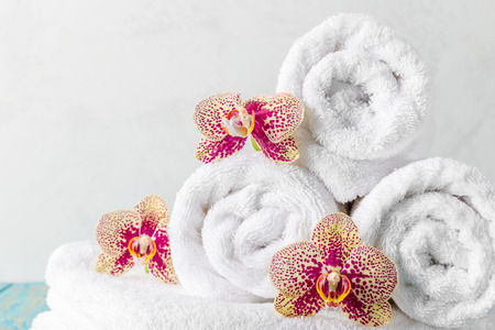 towels with orchid flowerの写真素材