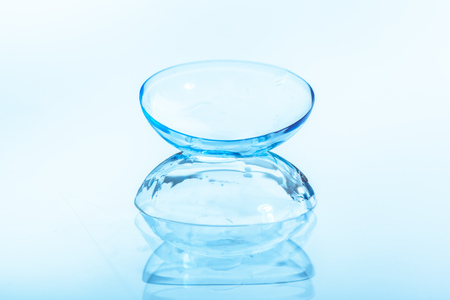 contact lens on blue backgroundの写真素材
