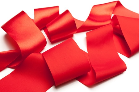 red ribbon isolated on white backgroundの写真素材