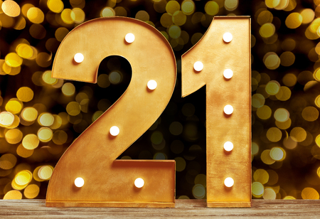 Big plastic numbers with shining light bulbsの写真素材