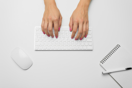 Woman's hands on a keyboardの写真素材