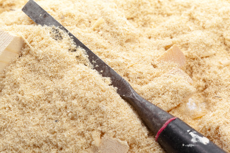 blade of sharp chisels with sawdust