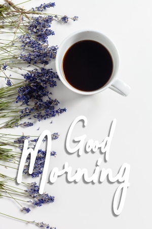 Coffee with flowers composition on the tableの写真素材