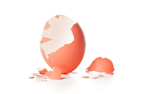 broken egg isolated on whiteの写真素材