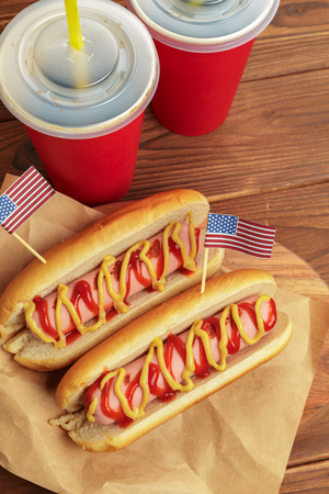 Hot dogs on wooden backgroundの写真素材