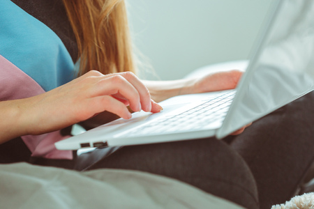 Young Woman Using Laptopの写真素材