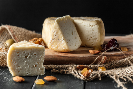 Cheese on the wooden tableの写真素材
