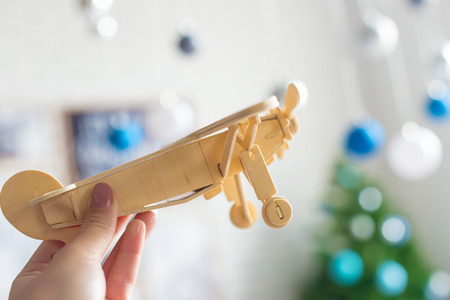toy airplane in hand