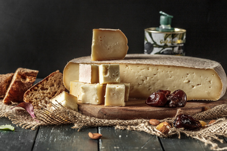 Cheese on the wooden tableの写真素材