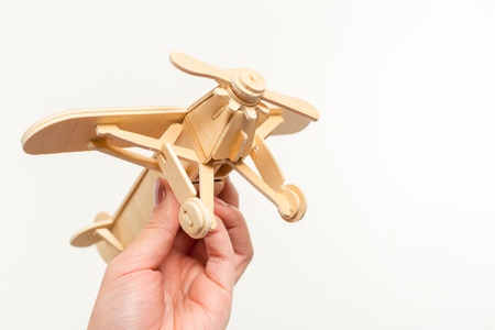 toy airplane in hand